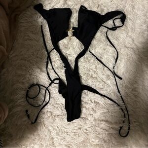 Black, one piece. Size medium from shein.